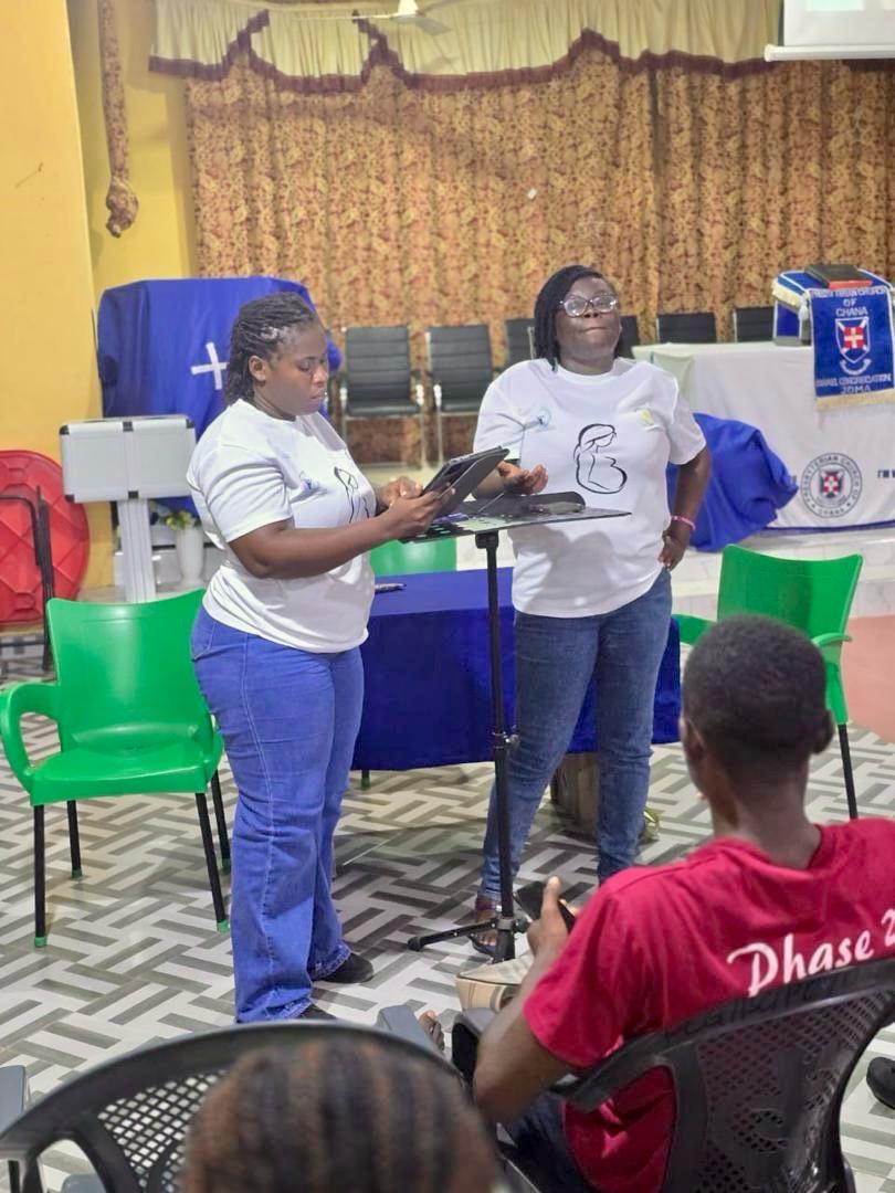 Two women presenting at a Presbyterian church