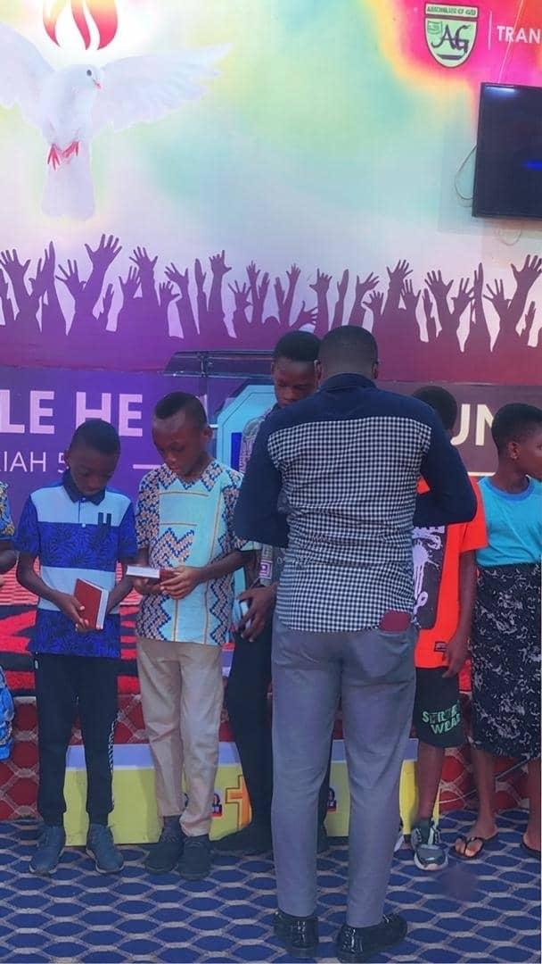 Youth on stage during worship